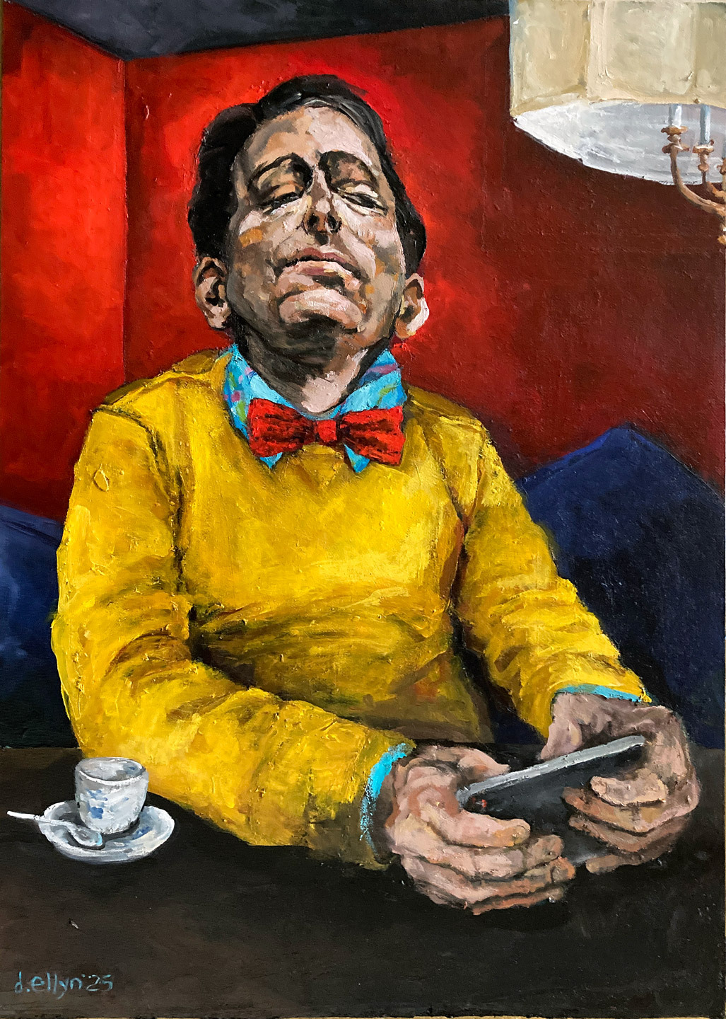 Back Facing Camera Selfie is a portrait of a man at an unflattering angle as he holds his phone low to take selfie. Wearing yellow sweater, blue shirt and bright red bowtie.